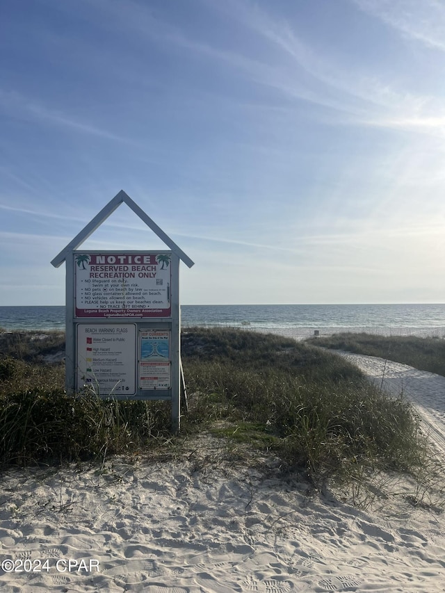 exterior details featuring a view of the beach