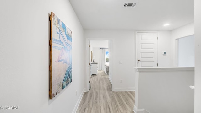 hall featuring light hardwood / wood-style flooring