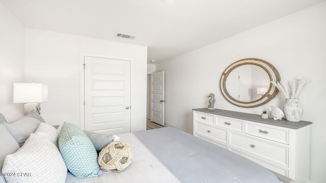 bedroom with light hardwood / wood-style flooring