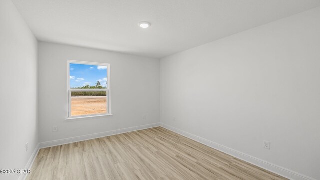 full bathroom featuring vanity, toilet, shower / bath combination, and hardwood / wood-style floors