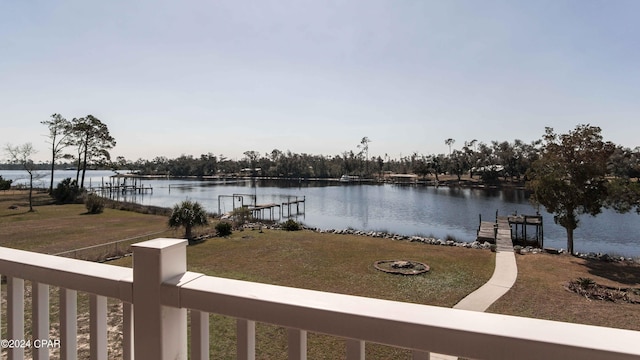 property view of water with a dock