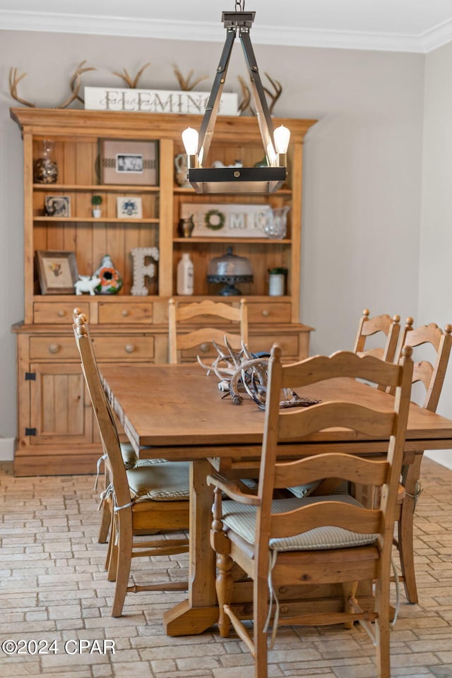 dining room with ornamental molding