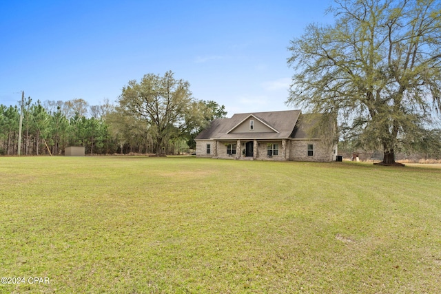 view of front of home with a front lawn