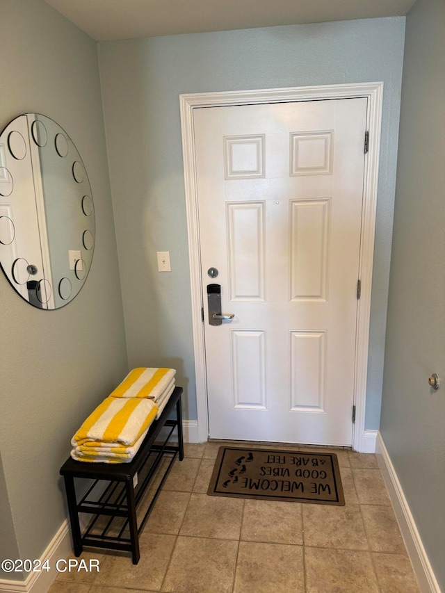 interior space with light tile patterned flooring