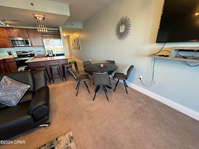 view of carpeted dining room