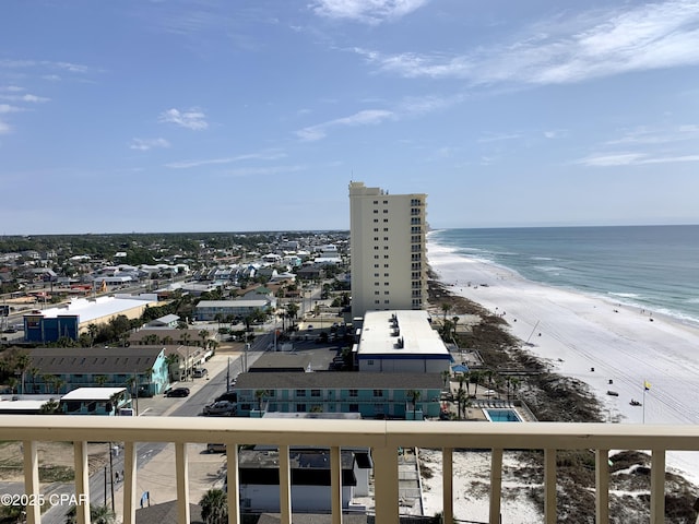 exterior space with a beach view and a water view