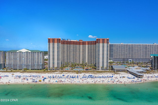 aerial view with a beach view and a water view