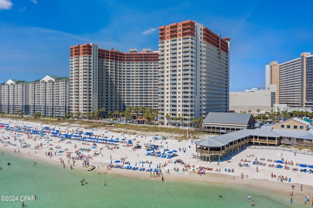 birds eye view of property featuring a beach view