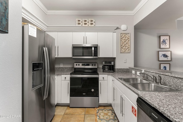 kitchen with white cabinetry, ornamental molding, sink, and stainless steel appliances