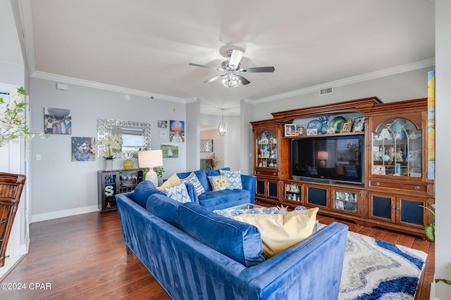 living room featuring dark hardwood / wood-style flooring, ceiling fan, and crown molding