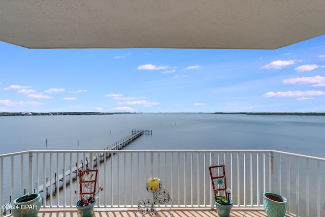 balcony featuring a water view