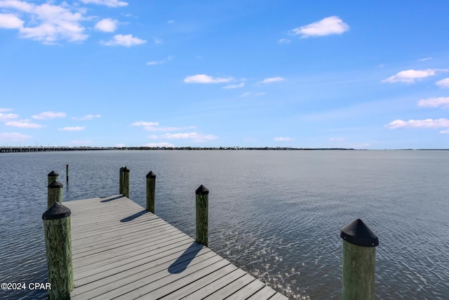 view of dock with a water view