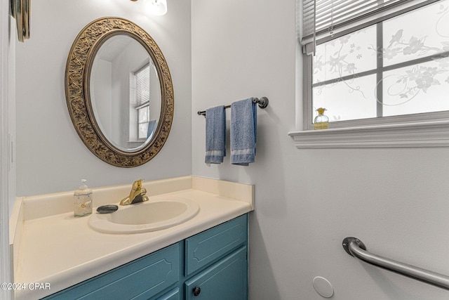 bathroom with plenty of natural light and vanity