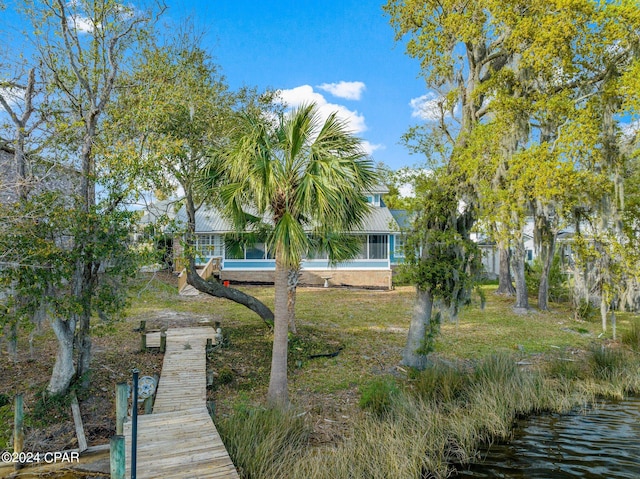 view of dock with a water view