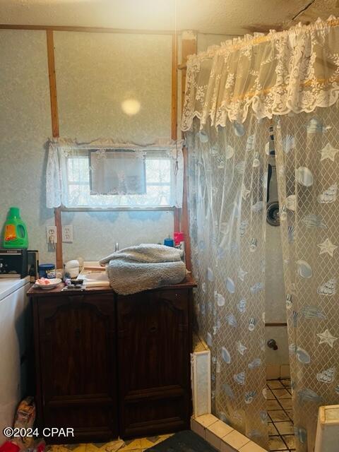 bathroom with walk in shower