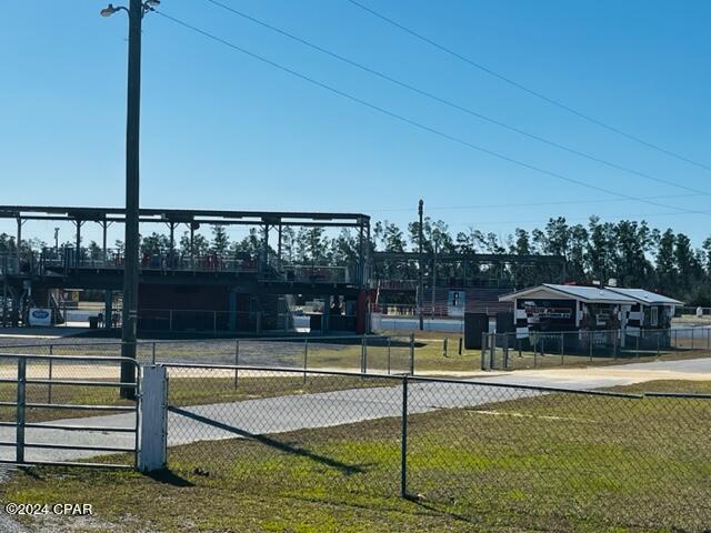 view of home's community with a lawn