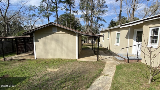 exterior space featuring a patio area and a yard