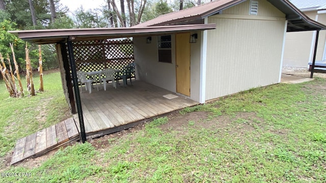 view of outdoor structure with a yard