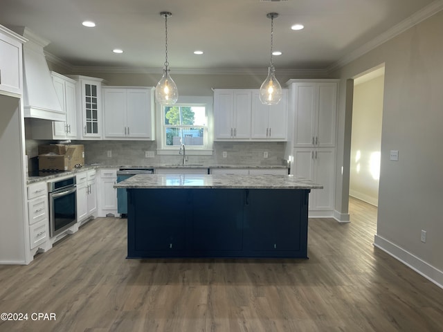 kitchen with white cabinets, light stone countertops, sink, and appliances with stainless steel finishes