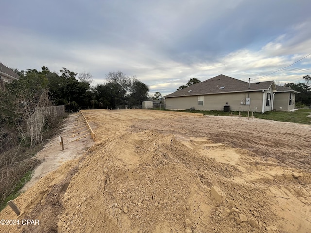 view of yard with central AC