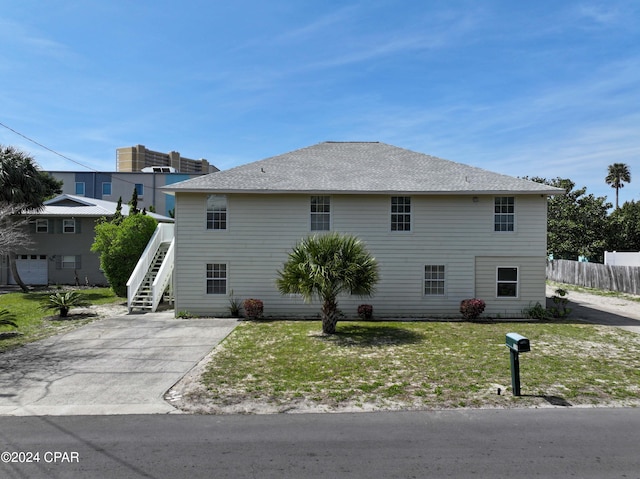 view of front of house with a front lawn