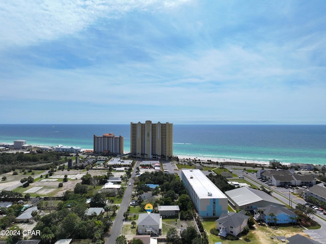 drone / aerial view with a water view and a view of the beach