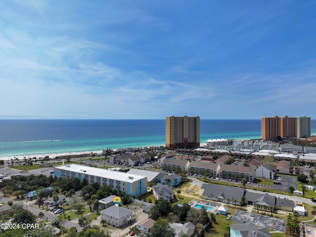 drone / aerial view with a water view and a view of the beach