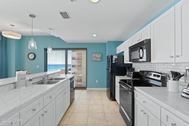 kitchen featuring white cabinetry, decorative light fixtures, backsplash, range with electric stovetop, and dishwasher