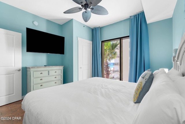 bedroom featuring ceiling fan and dark hardwood / wood-style flooring