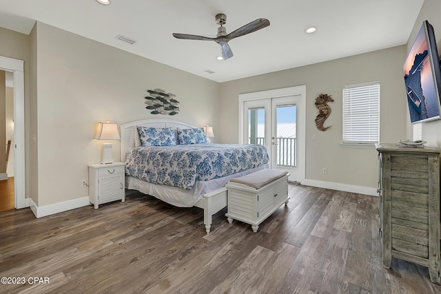 bedroom featuring dark hardwood / wood-style floors, access to outside, ceiling fan, and french doors