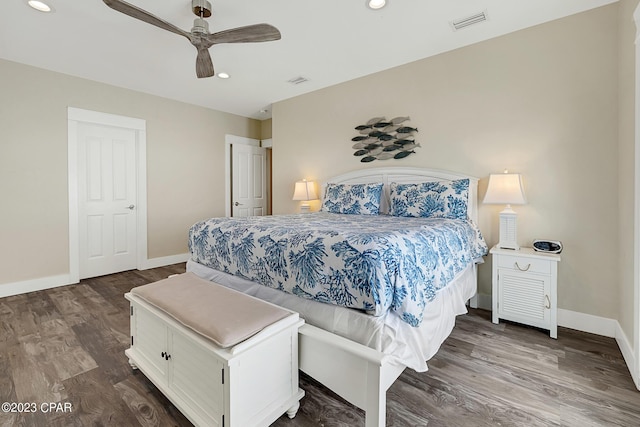 bedroom with dark wood-type flooring and ceiling fan