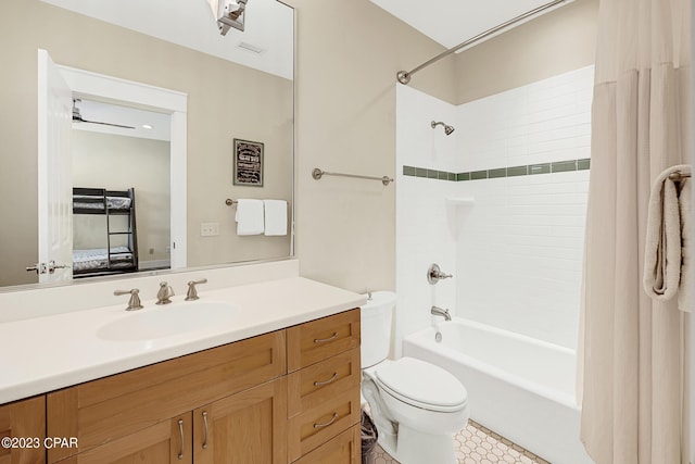 full bathroom featuring vanity, toilet, and shower / bath combo