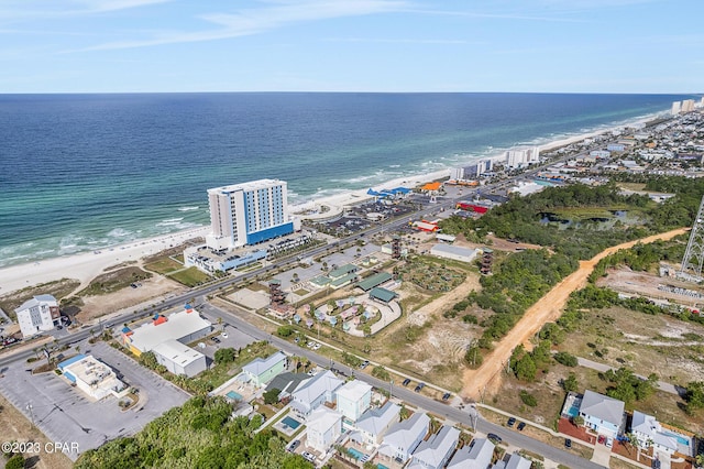 aerial view featuring a water view and a view of the beach