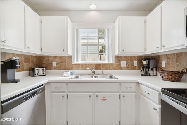 kitchen with sink, stainless steel dishwasher, and white cabinets