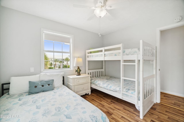 bedroom featuring hardwood / wood-style floors and ceiling fan