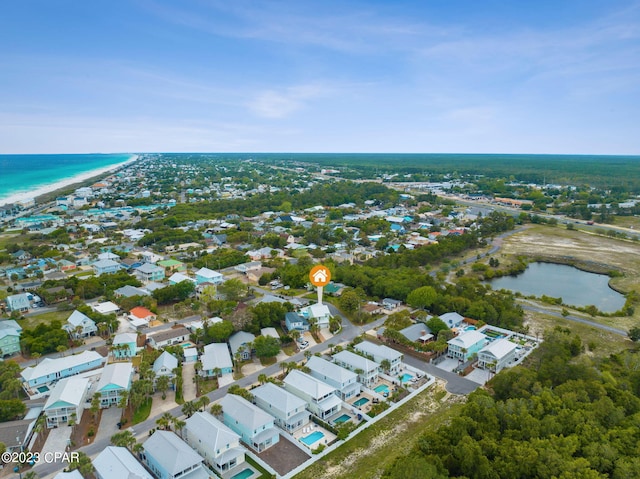 drone / aerial view with a water view