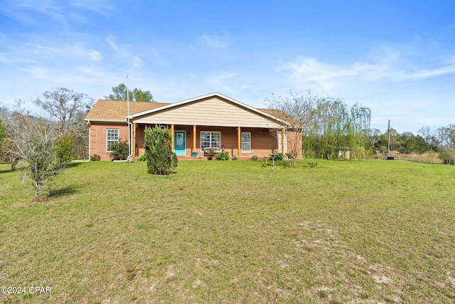 single story home with a front yard