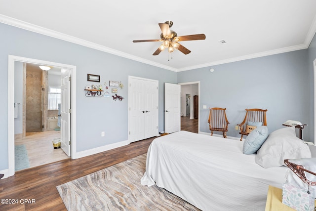 bedroom with connected bathroom, ceiling fan, a closet, ornamental molding, and dark hardwood / wood-style flooring