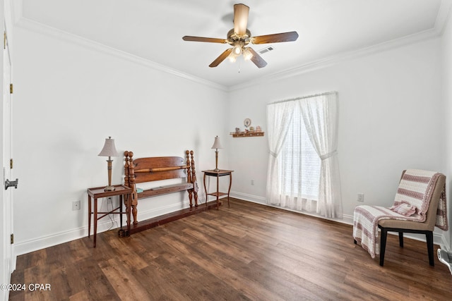 living area featuring dark hardwood / wood-style floors, ornamental molding, and ceiling fan