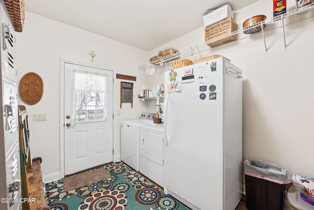 laundry area with separate washer and dryer