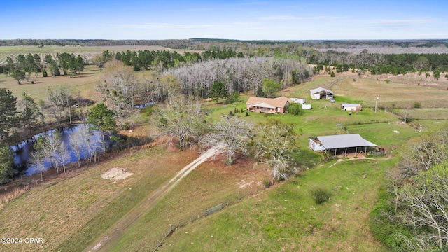 drone / aerial view with a rural view and a water view