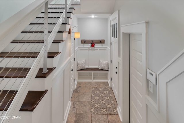 stairs featuring light tile floors