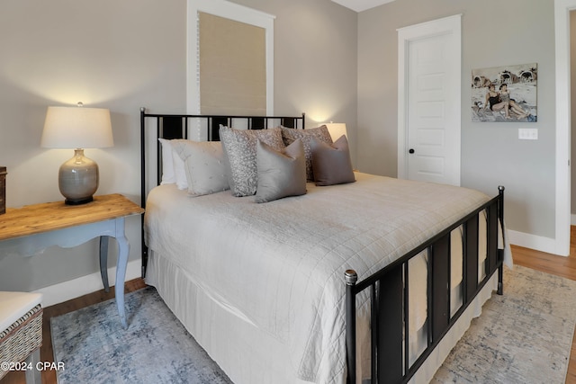 bedroom featuring light wood-type flooring