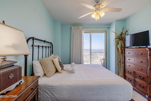 bedroom featuring access to outside and ceiling fan