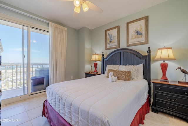 bedroom featuring access to exterior, ceiling fan, and light tile floors