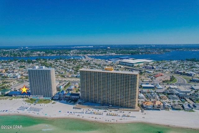 aerial view with a water view and a view of the beach