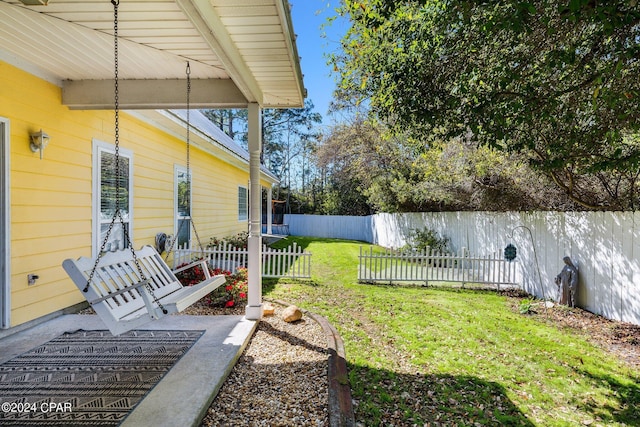 view of yard with a fenced backyard