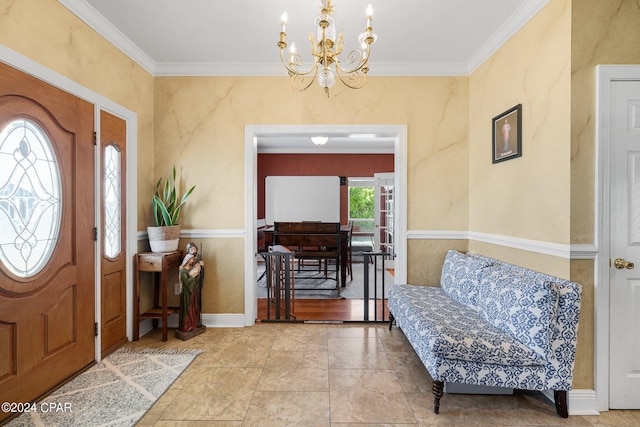 foyer entrance with ornamental molding and a notable chandelier