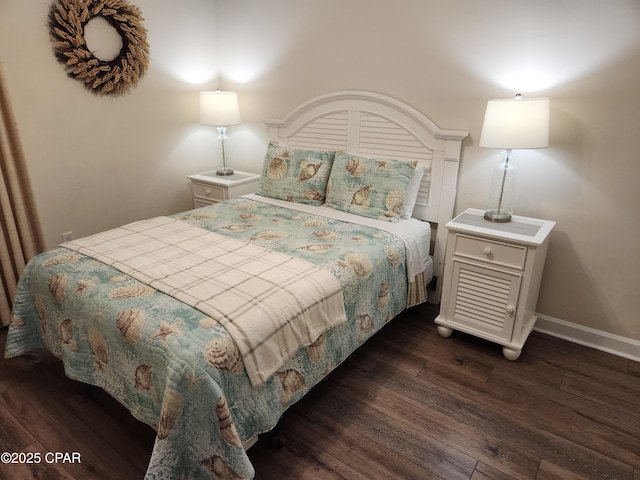 bedroom featuring dark hardwood / wood-style floors