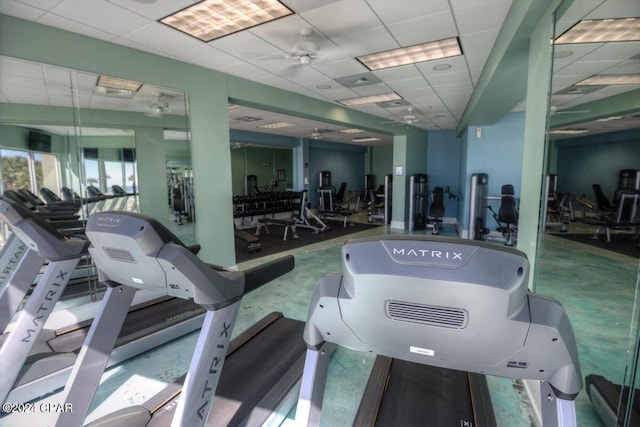 exercise room with a drop ceiling